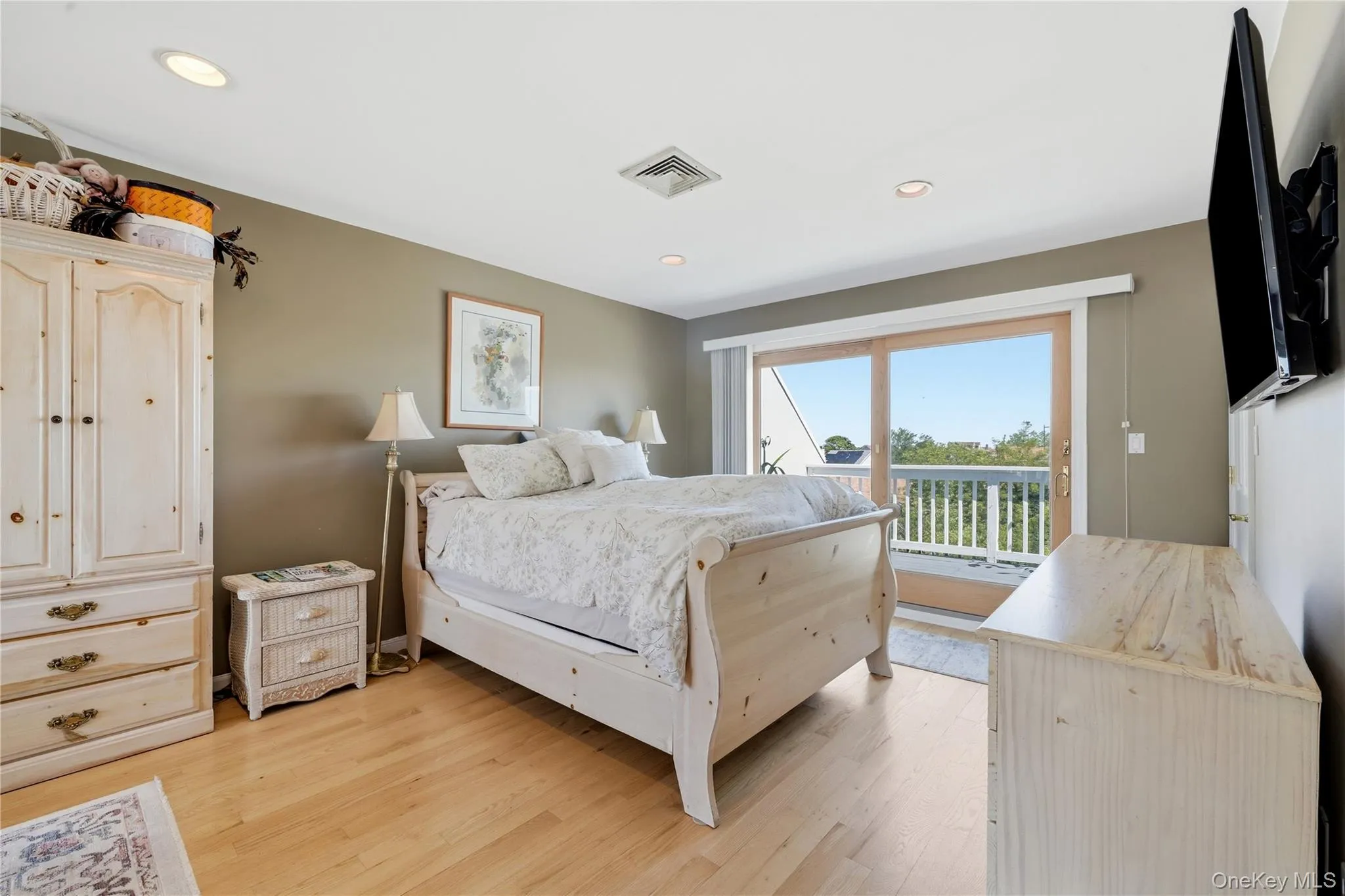 2nd Floor Master Bedroom with hardwood floors, recessed lighting, gas fireplace, and access to two private terraces 2nd Floor Master Bedroom with hardwood floors, recessed lighting, gas fireplace, and access to two private terraces
