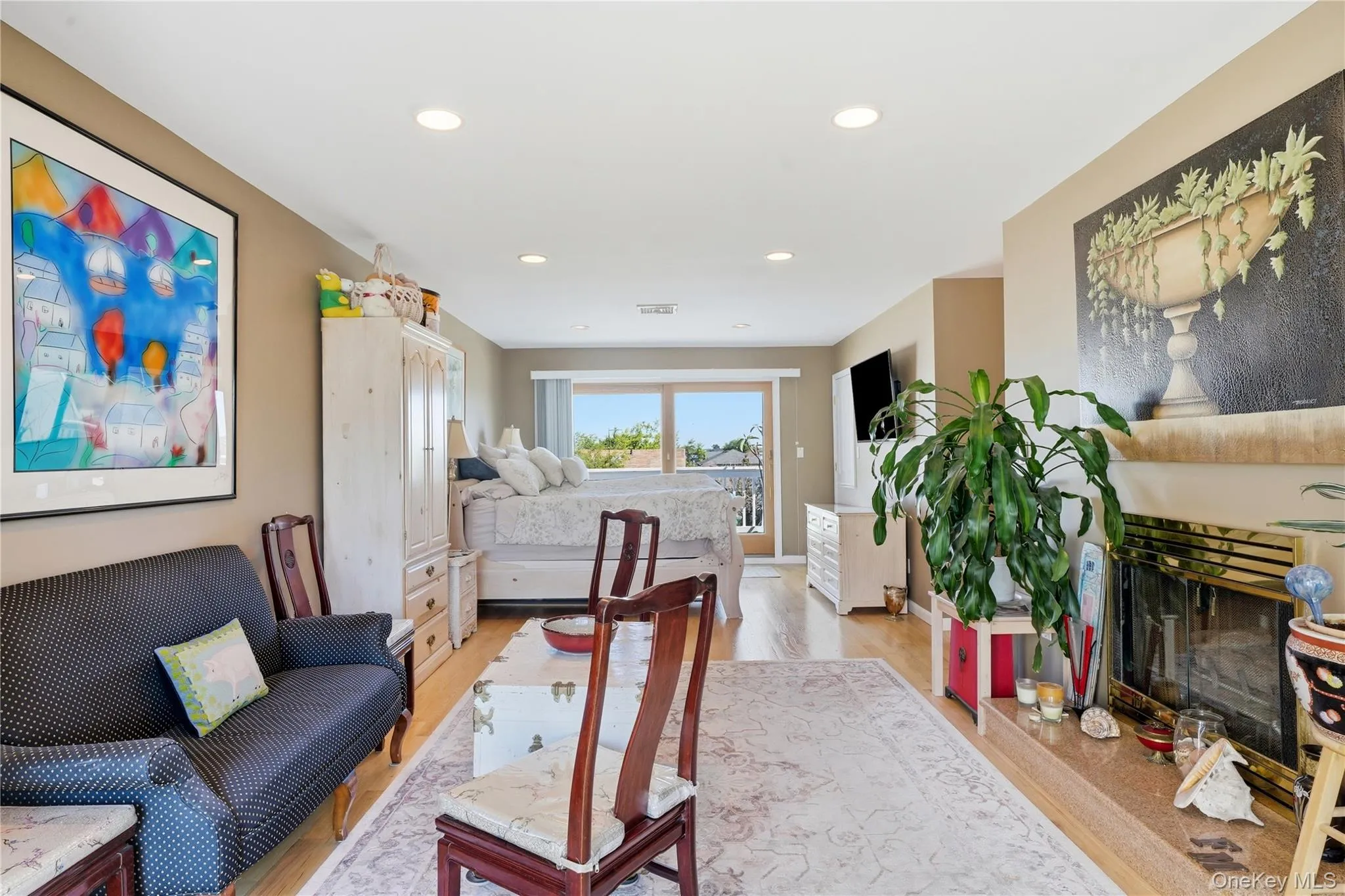 2nd Floor Master Bedroom with hardwood floors, recessed lighting, gas fireplace, and access to two private terraces 2nd Floor Master Bedroom with hardwood floors, recessed lighting, gas fireplace, and access to two private terraces