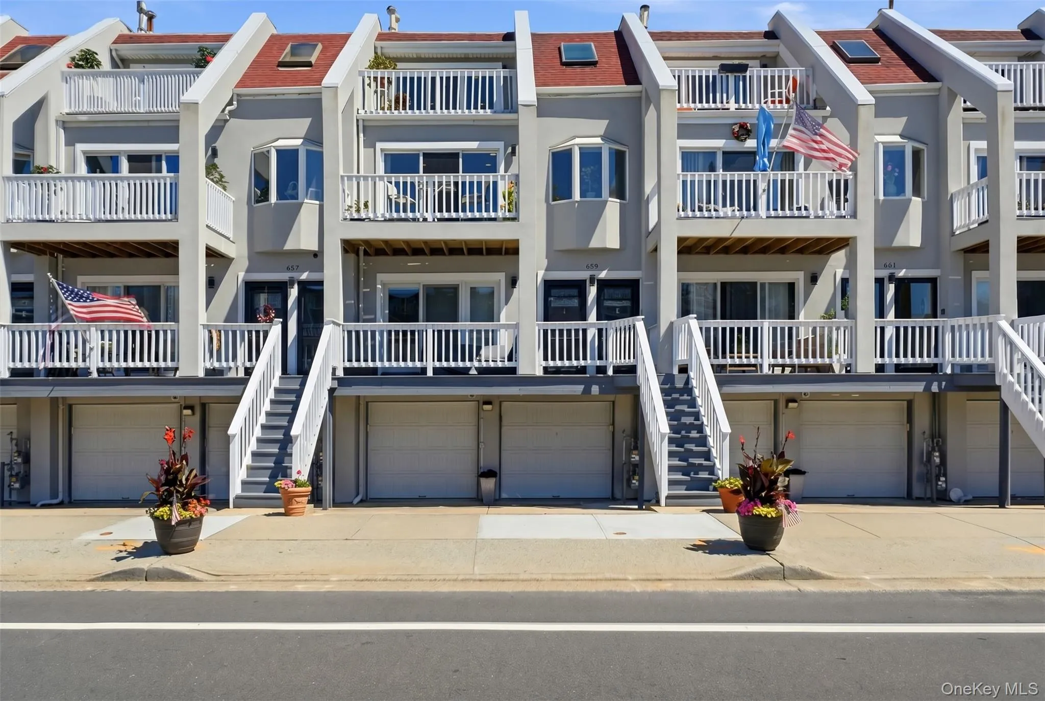 Townhouse-style condo with private entry, garage parking, driveway parking, and a prime location near the boardwalk and beach Townhouse-style condo with private entry, garage parking, driveway parking, and a prime location near the boardwalk and beach