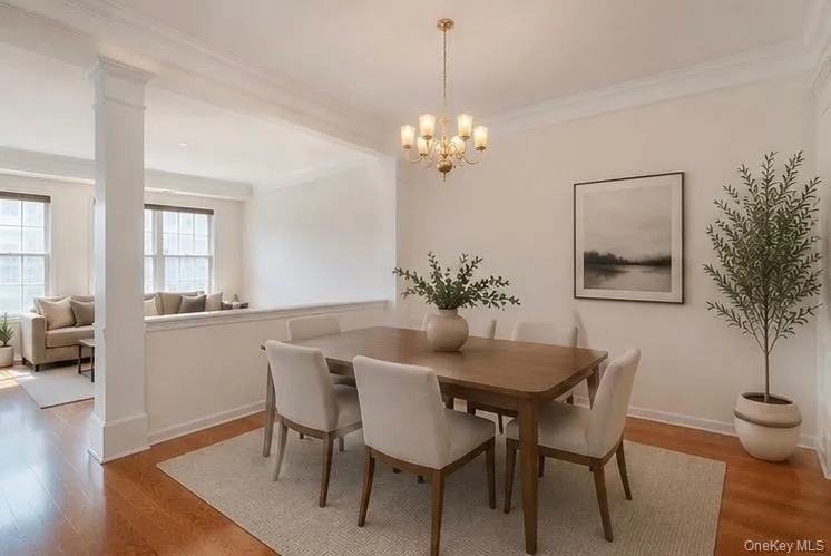 Warm wood-finish flooring complements the neutral wall tones Warm wood-finish flooring complements the neutral wall tones