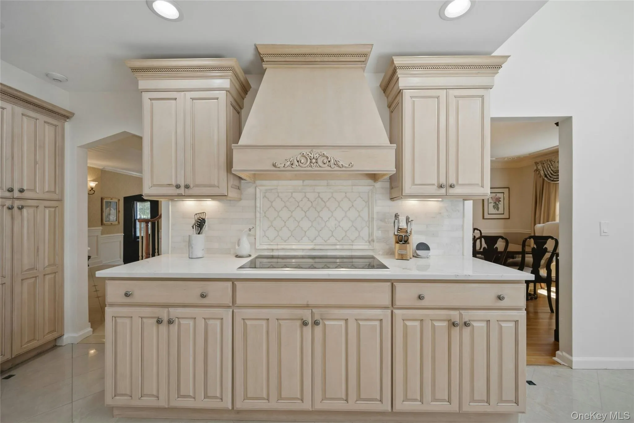 Kitchen with White Quartz Countertop and Designer Backsplash Kitchen with White Quartz Countertop and Designer Backsplash