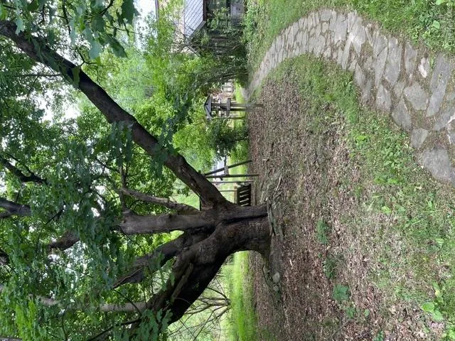 Stone path leading from home to huge barn Stone path leading from home to huge barn