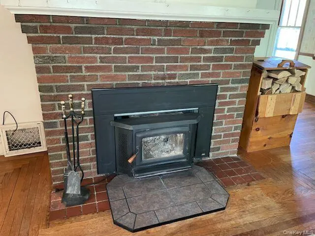 Brick fireplace with insert Brick fireplace with insert