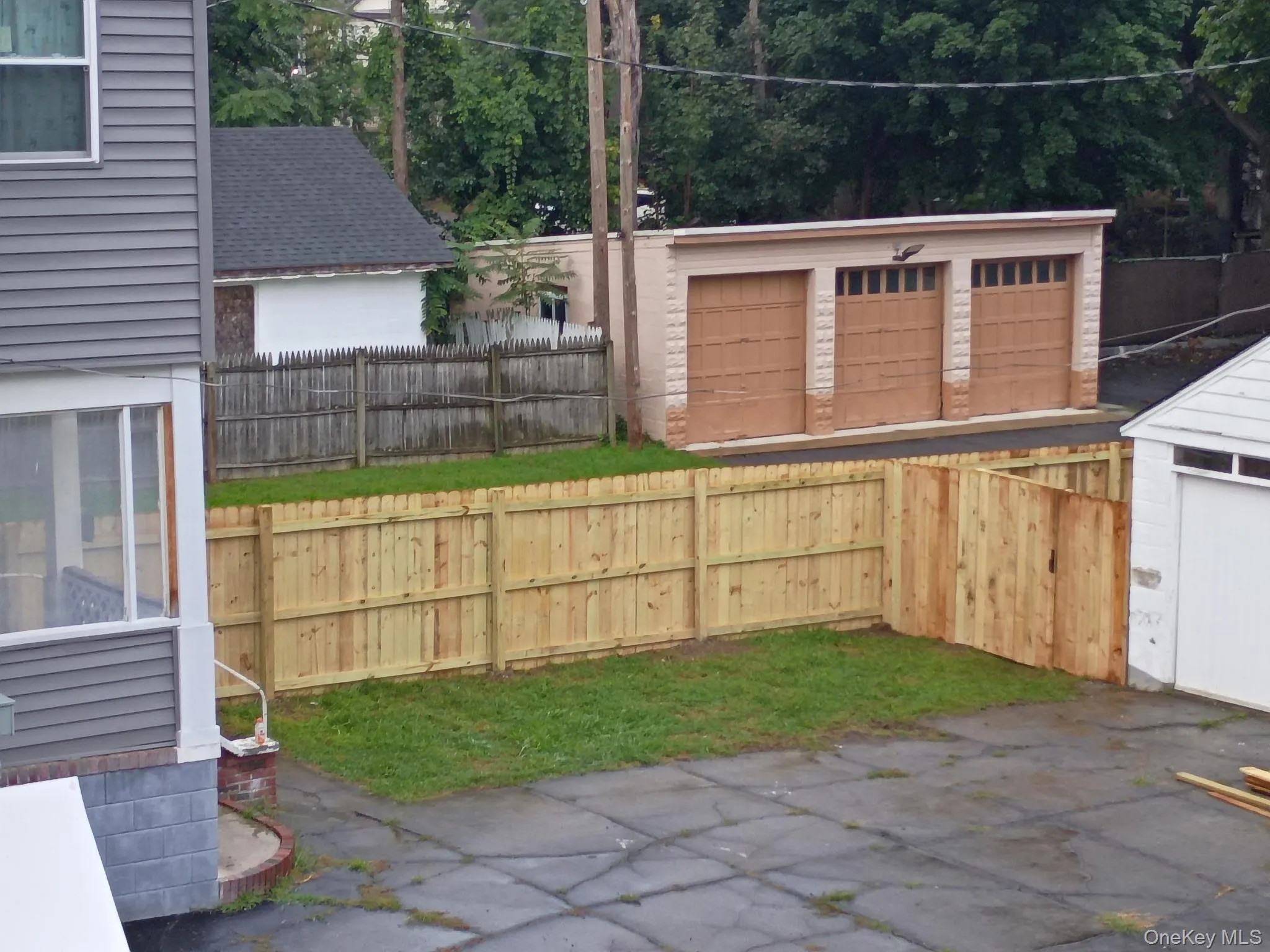 Fenced in backyard Fenced in backyard