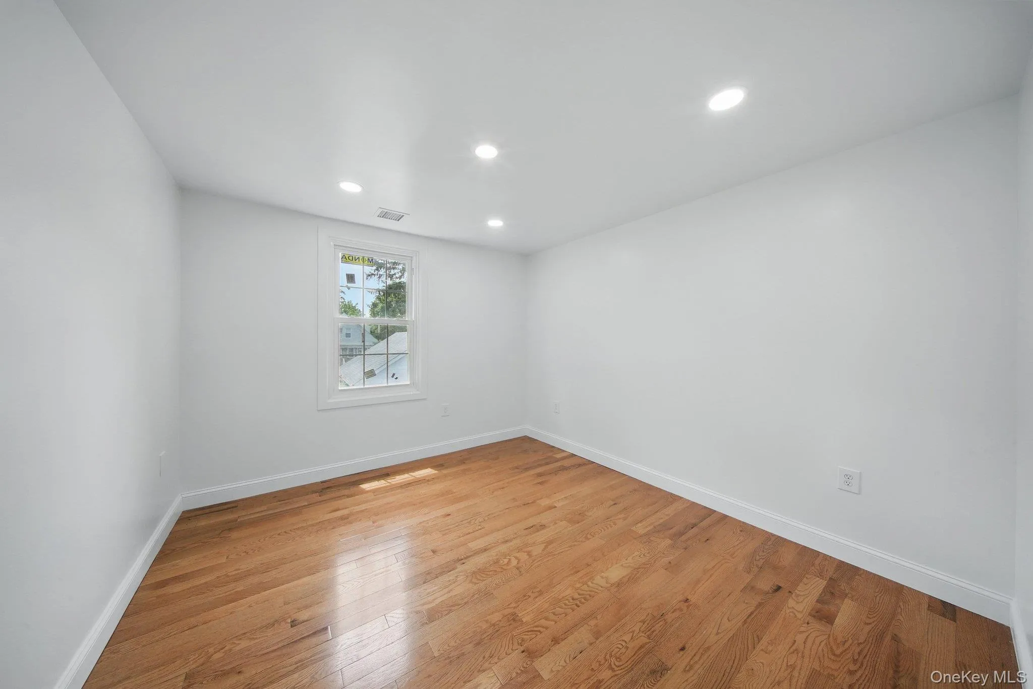 Unfurnished bedroom featuring light wood-style flooring, baseboards, and recessed lighting Unfurnished bedroom featuring light wood-style flooring, baseboards, and recessed lighting