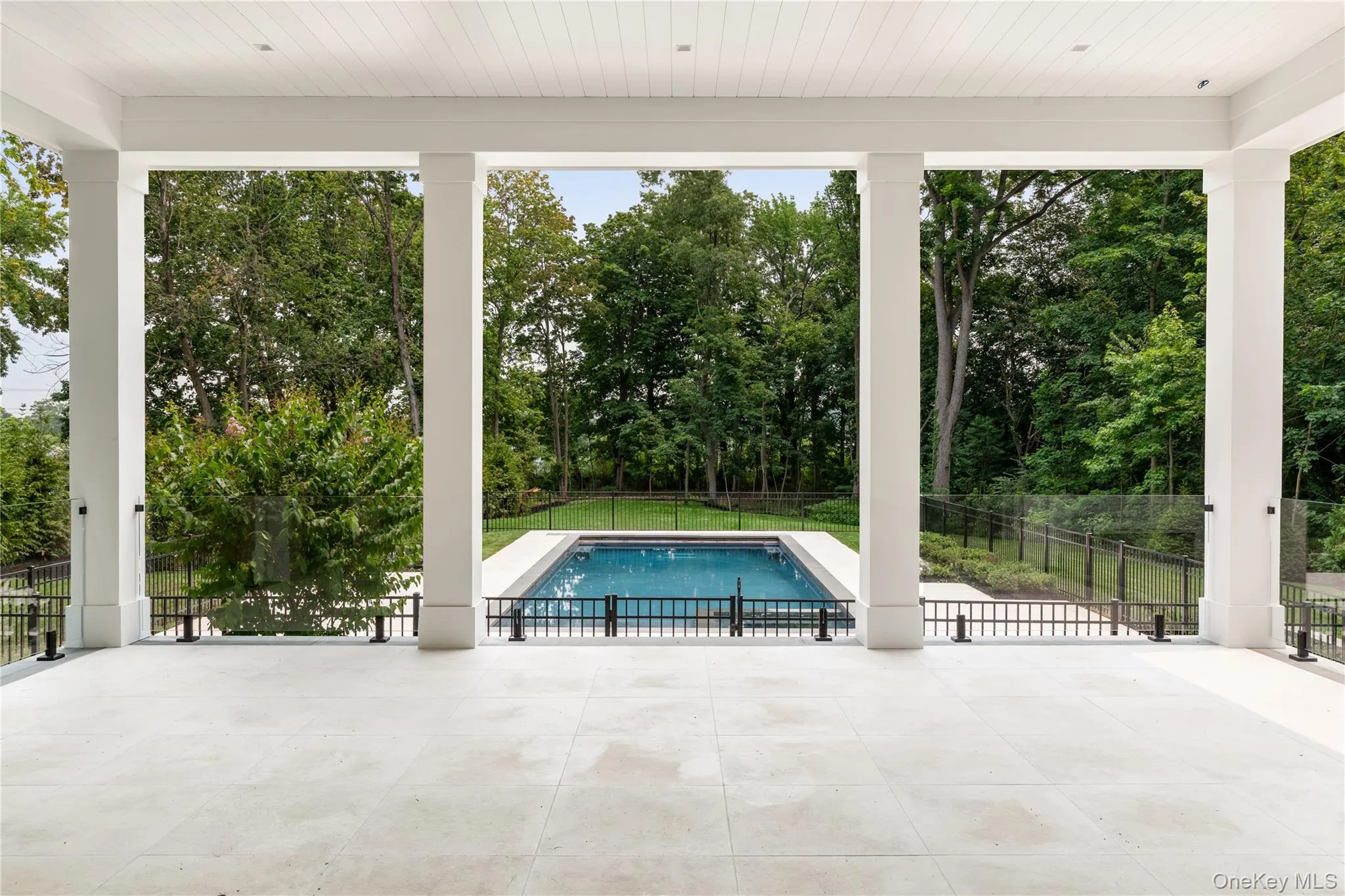Pool & Backyard View from Covered Patio Pool & Backyard View from Covered Patio