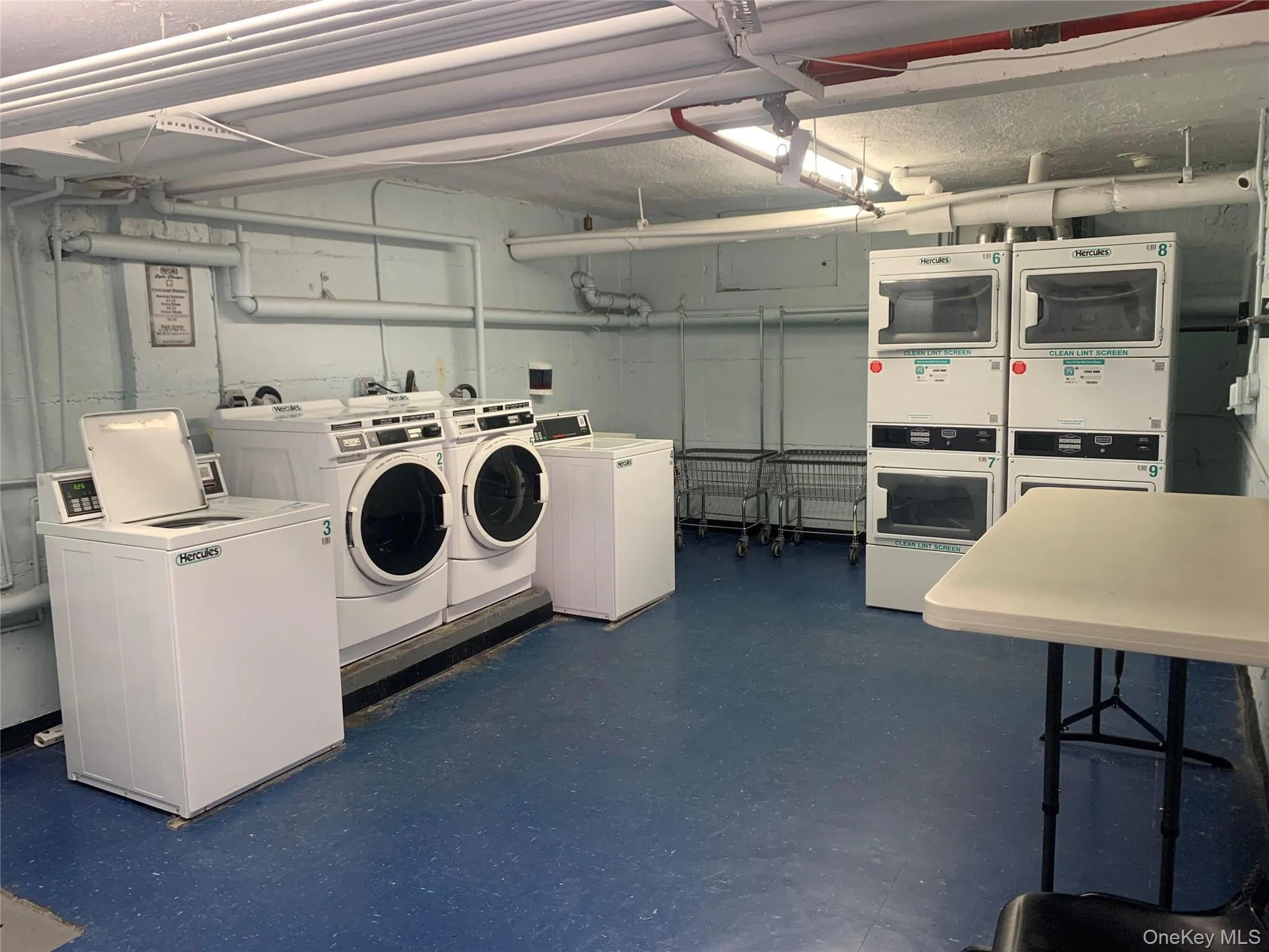 Shared laundry featuring washer and clothes dryer Shared laundry featuring washer and clothes dryer