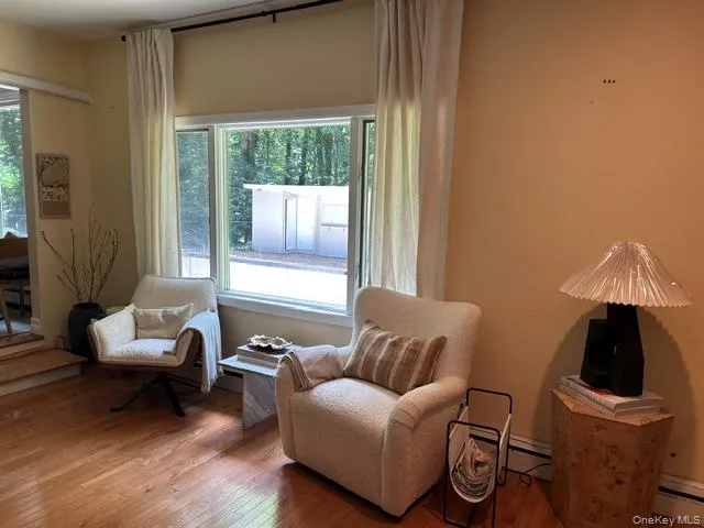 Situated off the kitchen and dining room. this area provides a view to the yard. Situated off the kitchen and dining room. this area provides a view to the yard.
