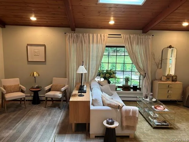 This sitting area is located in front of the fireplace, a great place to relax This sitting area is located in front of the fireplace, a great place to relax