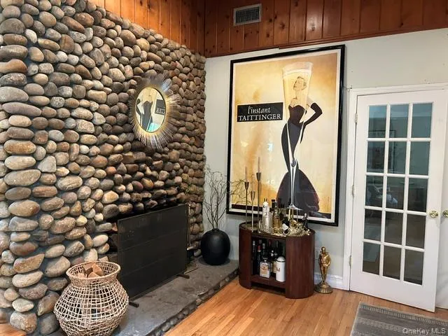 Feel the warmth from this rustic stone fireplace. Feel the warmth from this rustic stone fireplace.