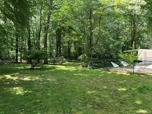 Another view of the spacious yard Another view of the spacious yard