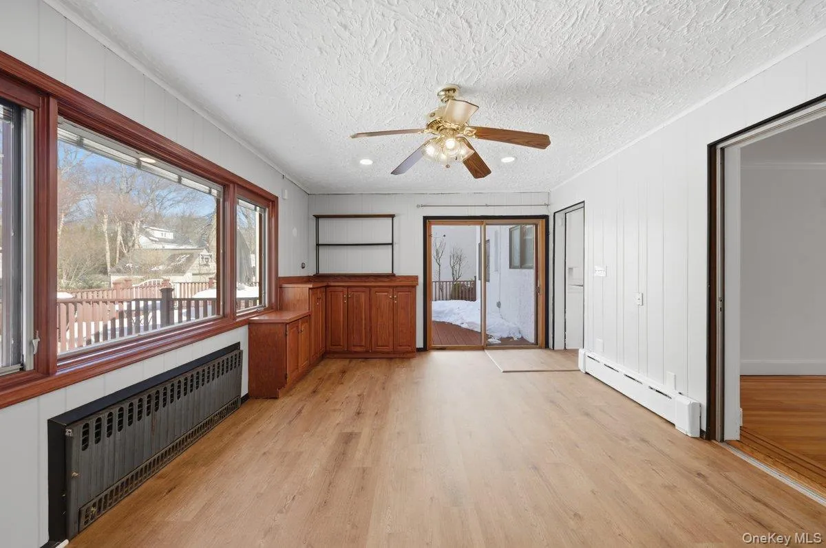 Sunroom with sliding glass door to the deck Sunroom with sliding glass door to the deck