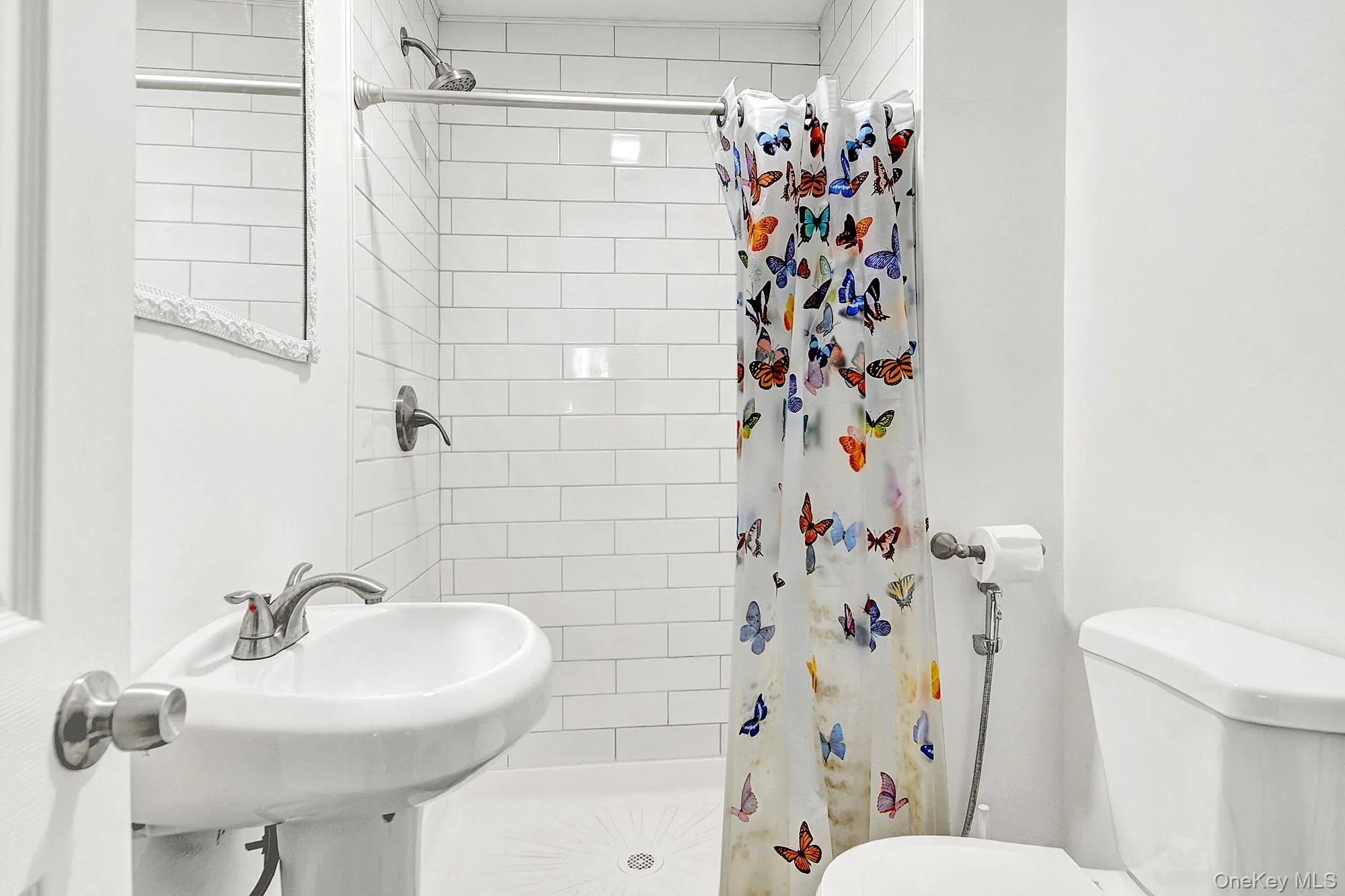 Primary bathroom with a walk-in shower Primary bathroom with a walk-in shower