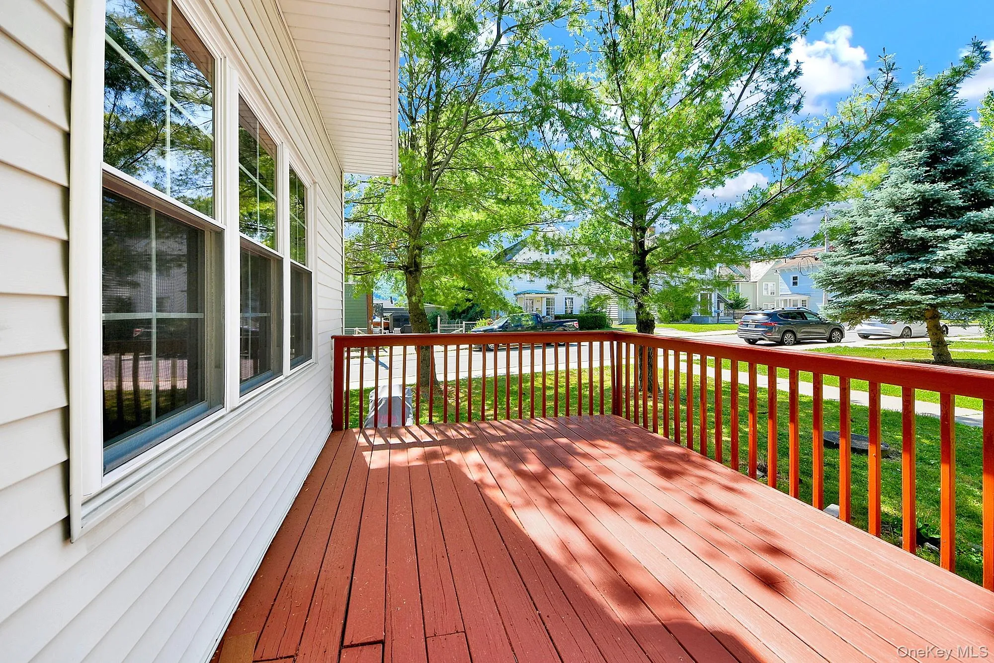 Large wooden deck off the kitchen where you can grill and dine al fresco Large wooden deck off the kitchen where you can grill and dine al fresco