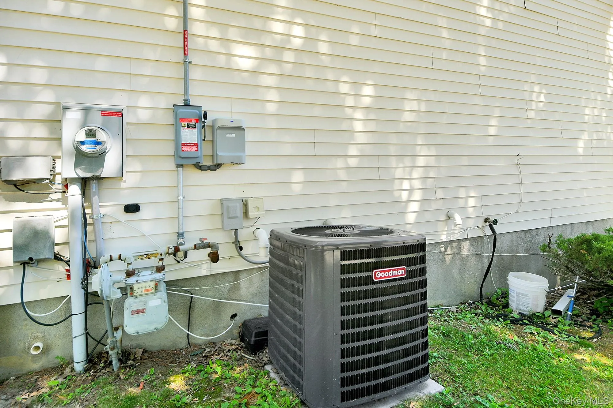 Central AC condenser outside Central AC condenser outside