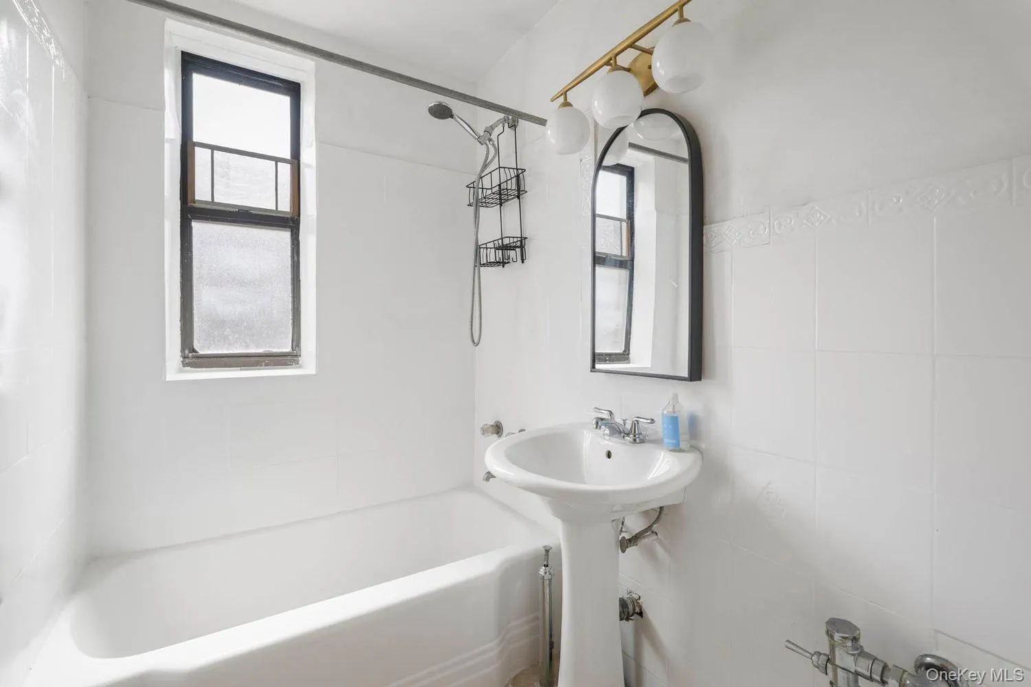 Full bath featuring bathing tub / shower combination Full bath featuring bathing tub / shower combination
