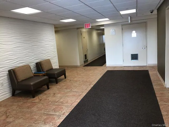 Lobby with a paneled ceiling Lobby with a paneled ceiling