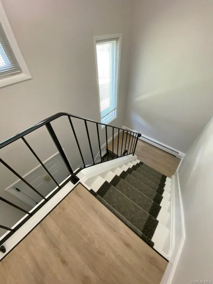 There staircase leading to the main living level makes the space seem like a private home There staircase leading to the main living level makes the space seem like a private home