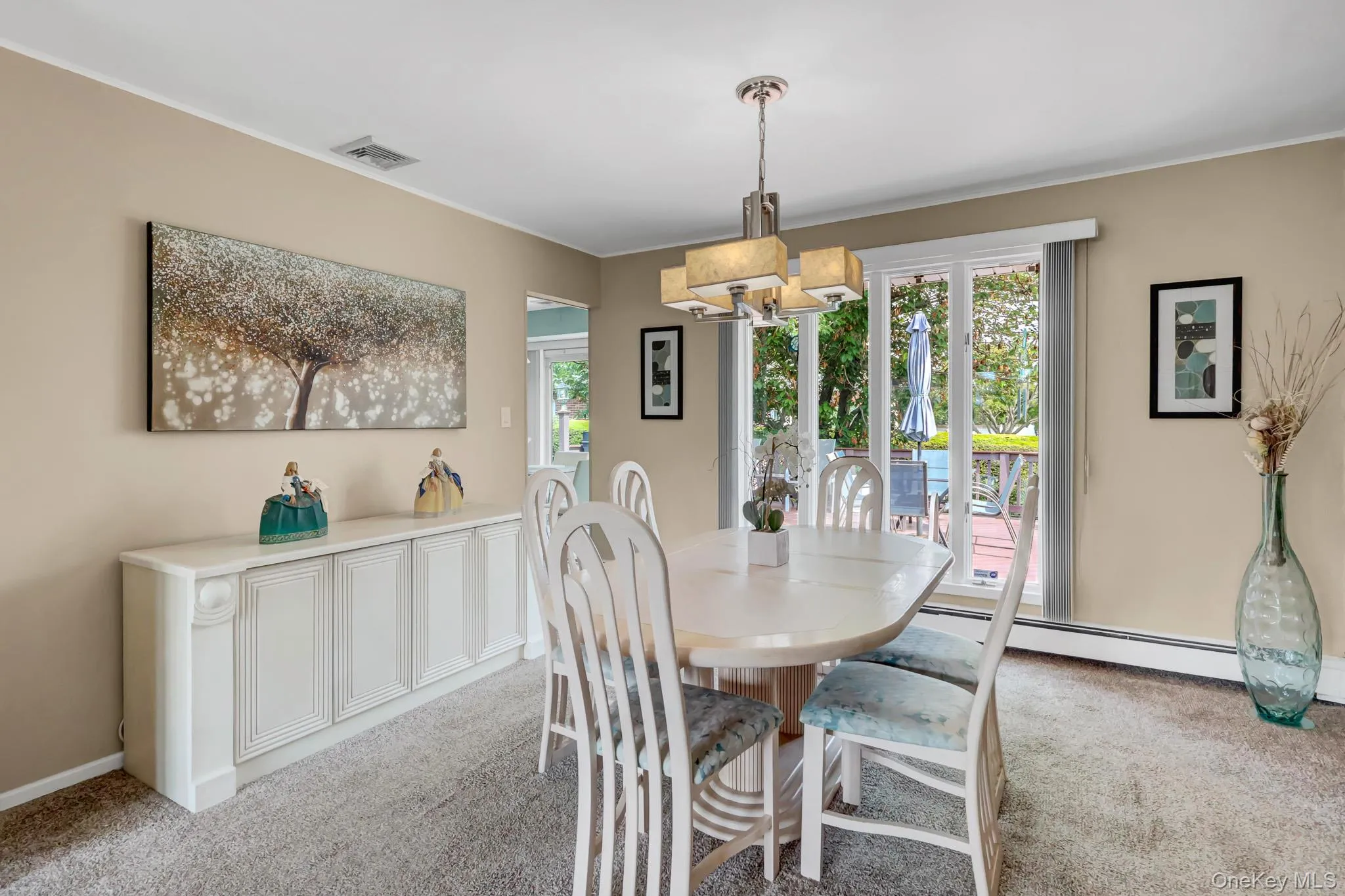 Formal dining room w/ floor to ceiling Anderson windows Formal dining room w/ floor to ceiling Anderson windows