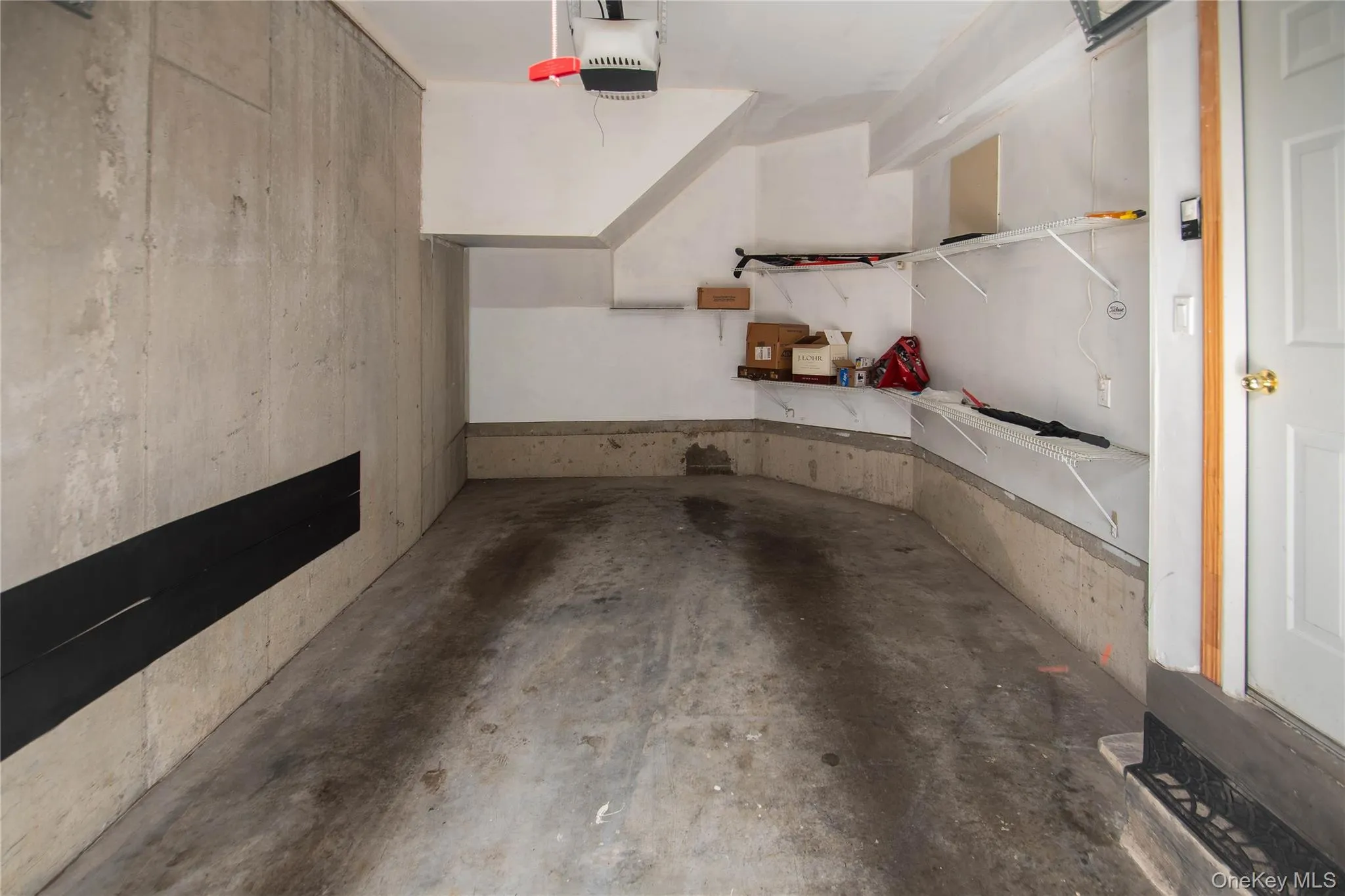 Garage with a garage door opener Garage with a garage door opener