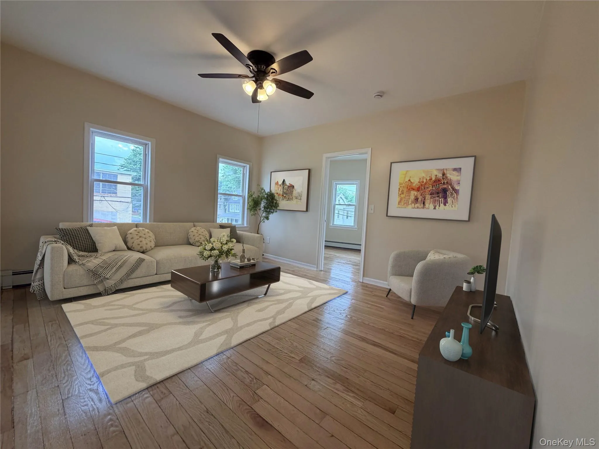 Warm wood-finish flooring complements the neutral wall tones Warm wood-finish flooring complements the neutral wall tones