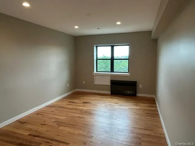 Bedroom with Hardwood Flooring Bedroom with Hardwood Flooring
