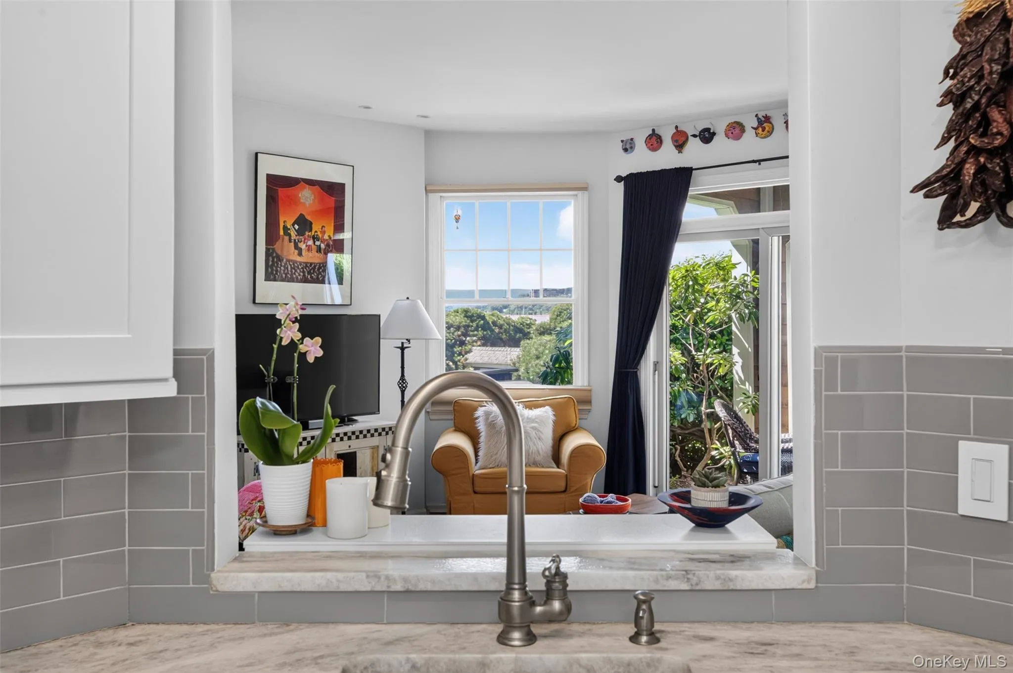 Pass-Through Opening creates View of Hudson River & Outdoors from the Kitchen. Pass-Through Opening creates View of Hudson River & Outdoors from the Kitchen.