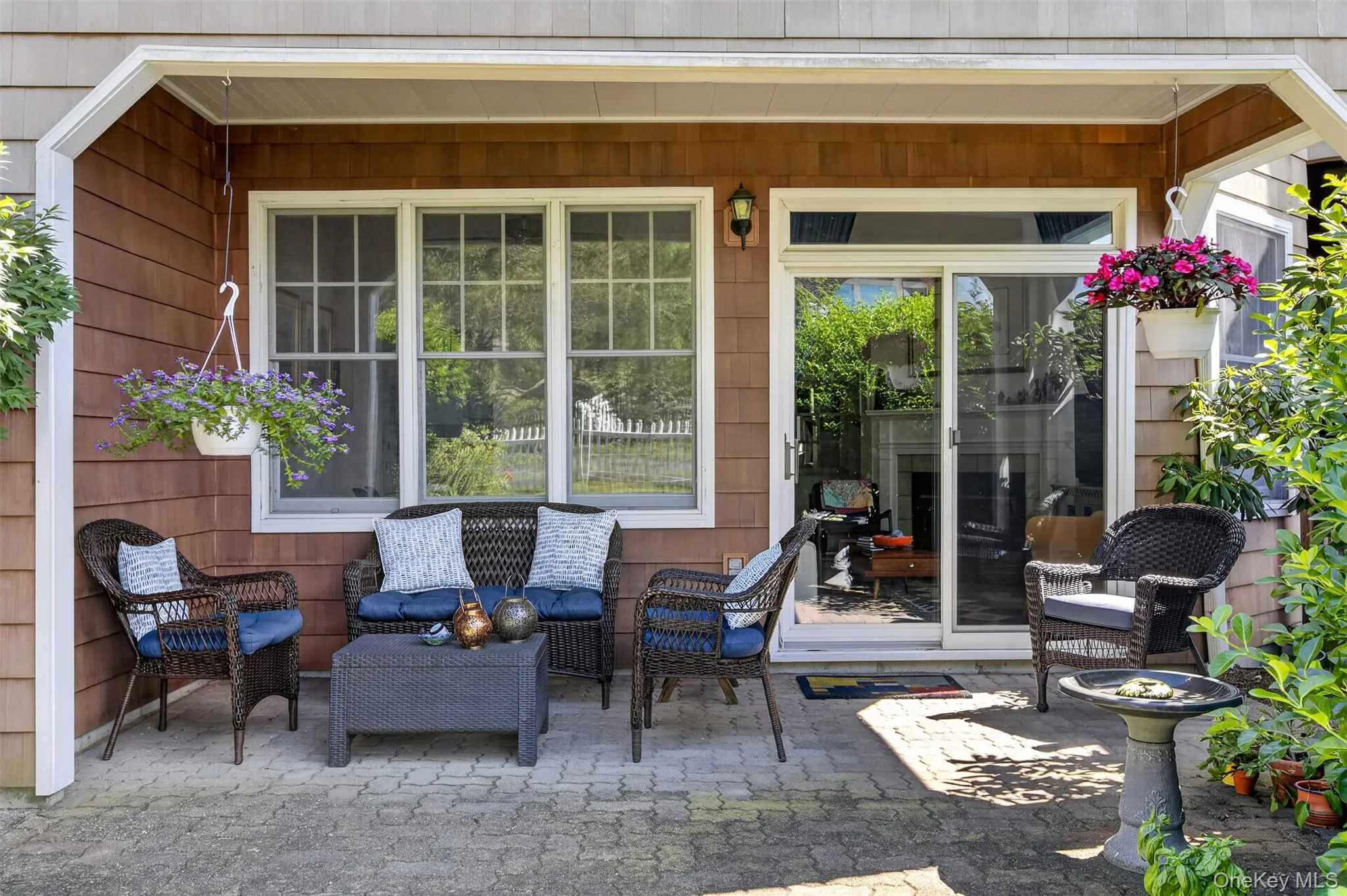 Patio Area off Living Room. Patio Leads to Fenced-in Lawn Area with Views of Hudson River and Spectacular Sunsets. Patio Area off Living Room. Patio Leads to Fenced-in Lawn Area with Views of Hudson River and Spectacular Sunsets.