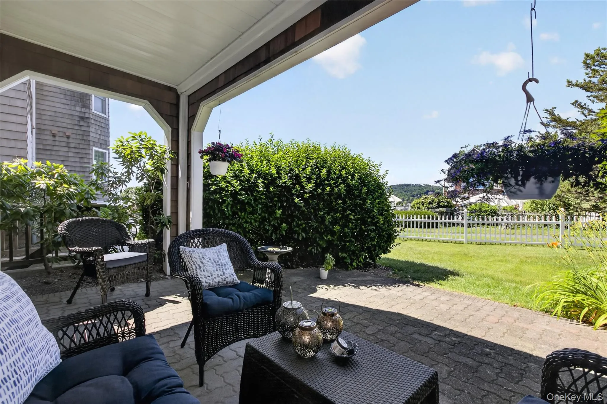 Large Patio off Living Room and grassy area with Views of The Hudson and Amazing Sunsets. Large Patio off Living Room and grassy area with Views of The Hudson and Amazing Sunsets.