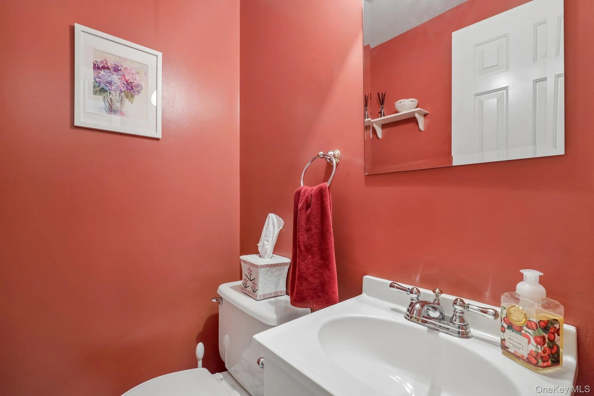 Powder room, ideal location at base of staircase. Powder room, ideal location at base of staircase.