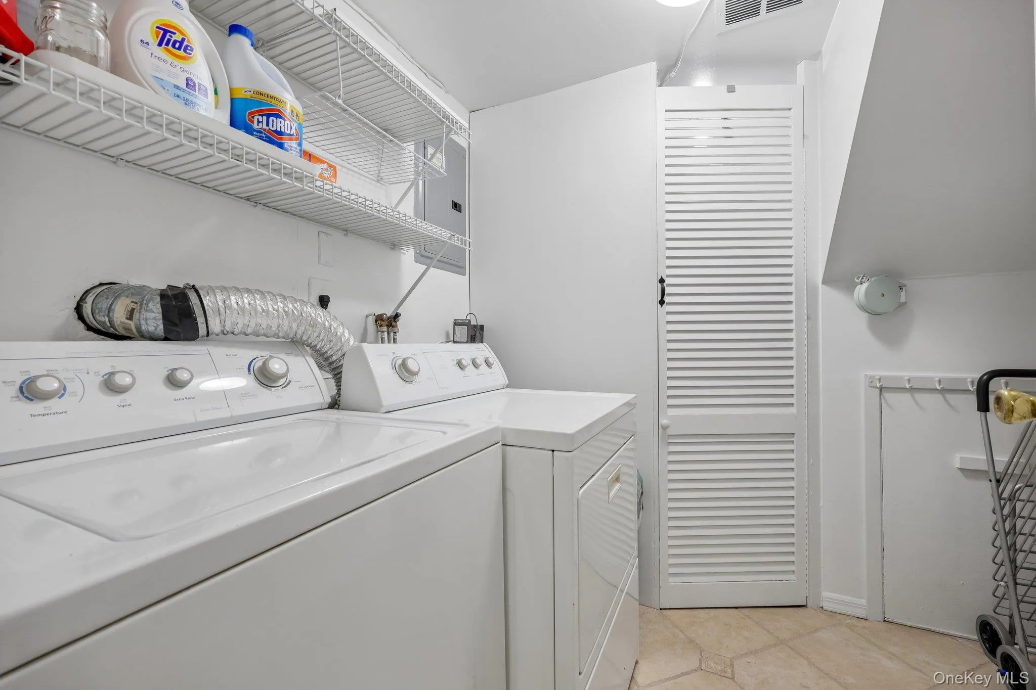 Door way to Utility room. New Gas furnace(2020) and AC coil & condenser Door way to Utility room. New Gas furnace(2020) and AC coil & condenser