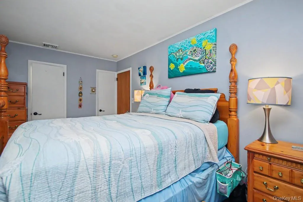 Another view of the Primary Bedroom. Door to ensuite full bathroom on far wall. Another view of the Primary Bedroom. Door to ensuite full bathroom on far wall.