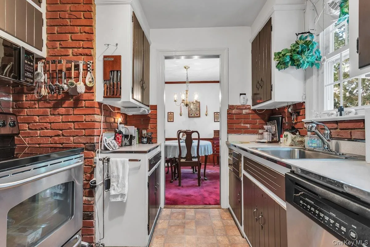 Galley Kitchen- Stainless Appliances Galley Kitchen- Stainless Appliances
