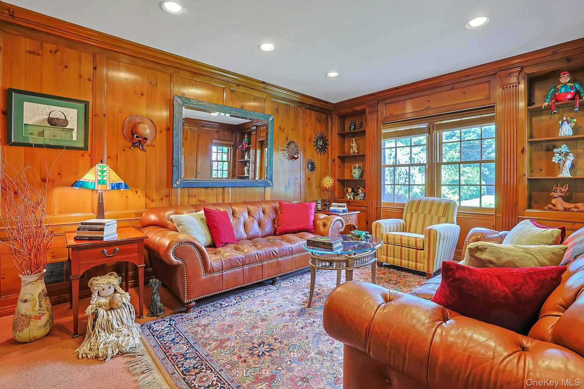 Den/entertainment room boasting incredible mill work Den/entertainment room boasting incredible mill work
