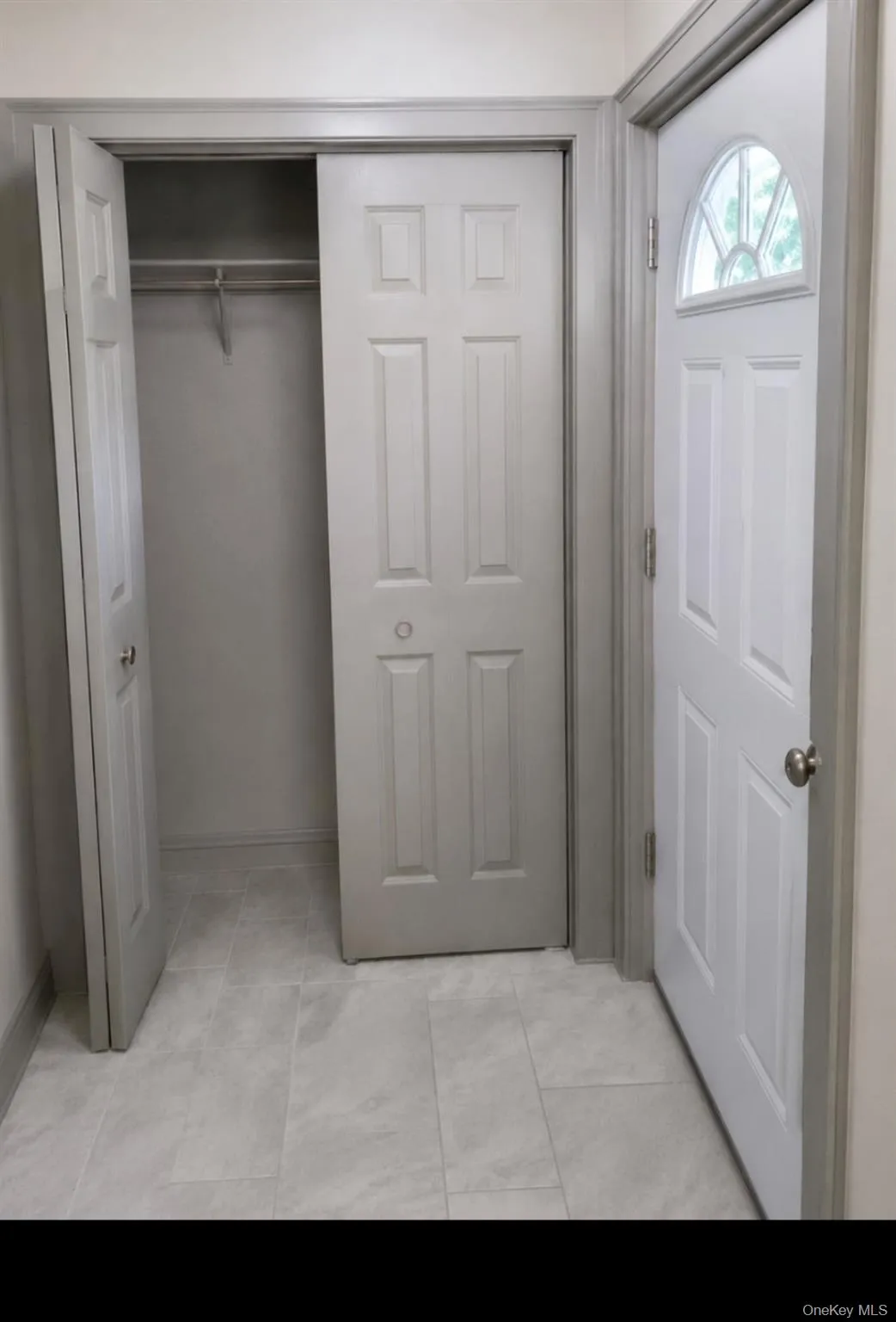Entry with double coat closet with room for a shoe bench Entry with double coat closet with room for a shoe bench