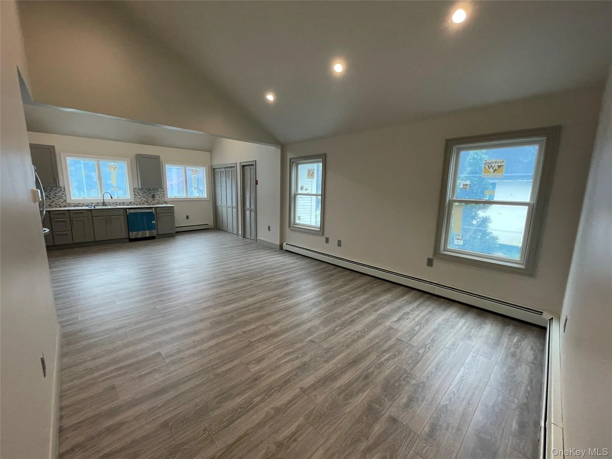 Recessed lighting, large windows and vaulted ceiling give the ranch beautiful lighting day and night Recessed lighting, large windows and vaulted ceiling give the ranch beautiful lighting day and night