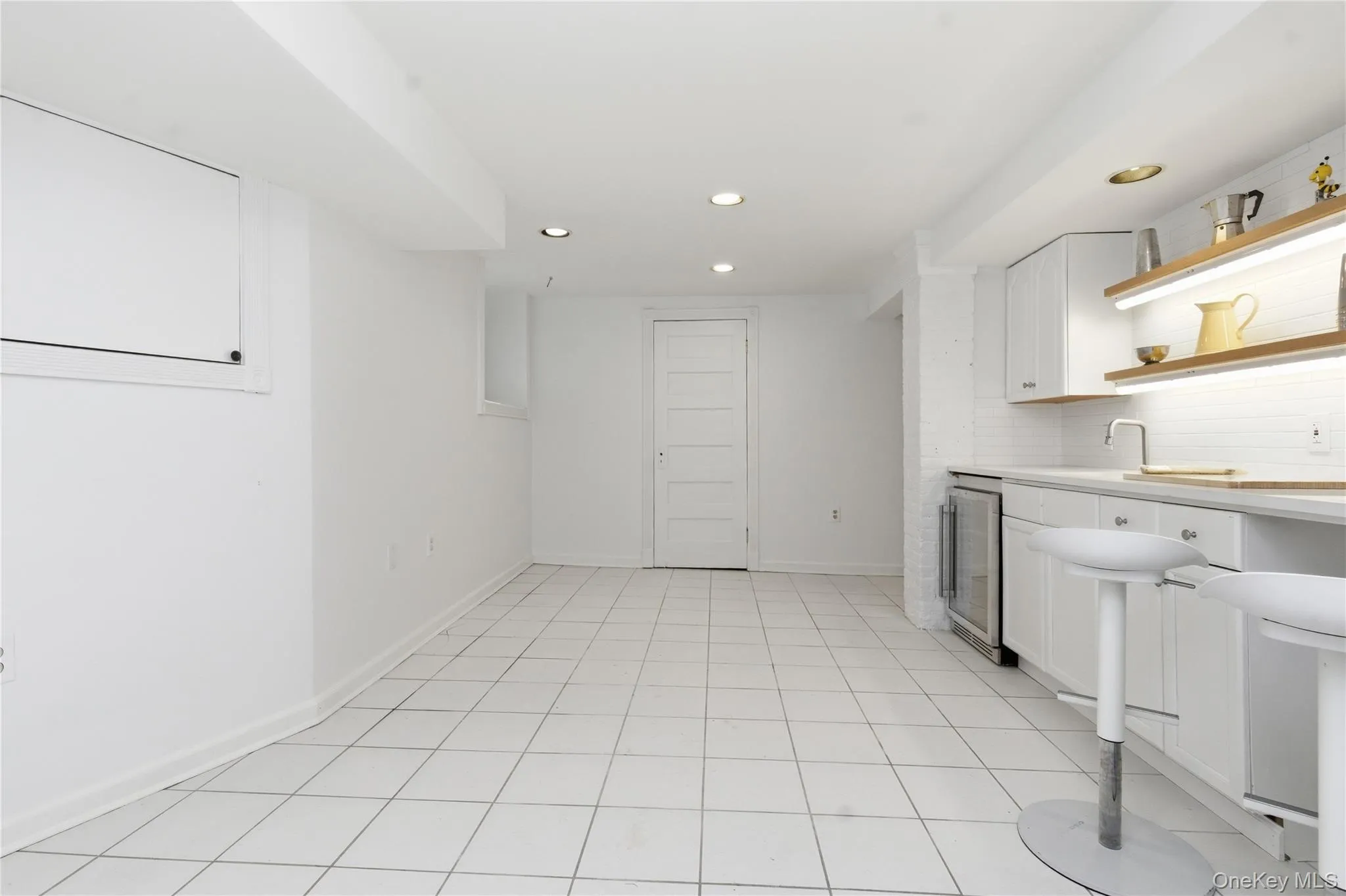 Expansive lower level offering endless possibilities for a gym, recreation room, home office, or media space. Expansive lower level offering endless possibilities for a gym, recreation room, home office, or media space.
