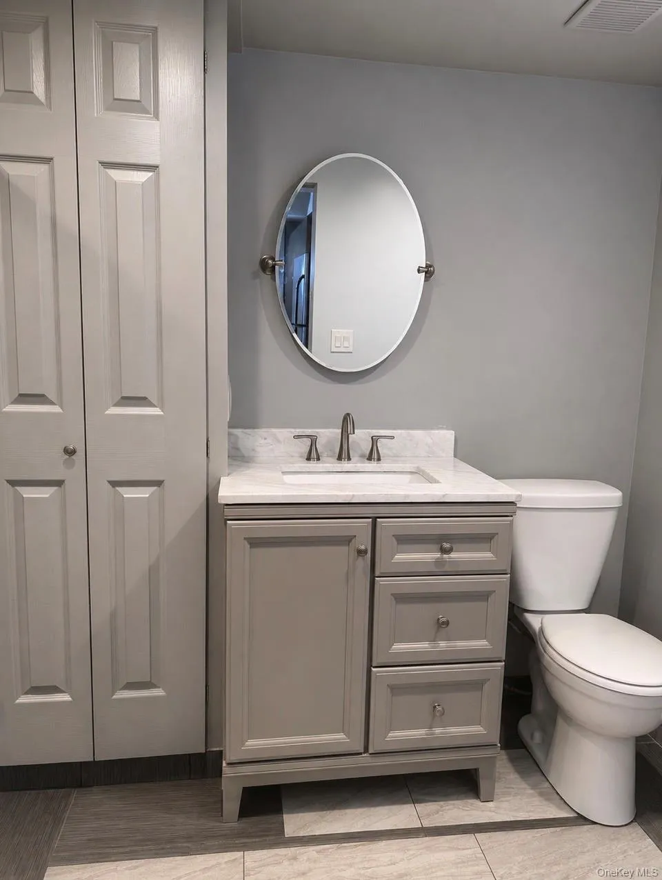 Bathroom with walk-in shower. Bathroom with walk-in shower.