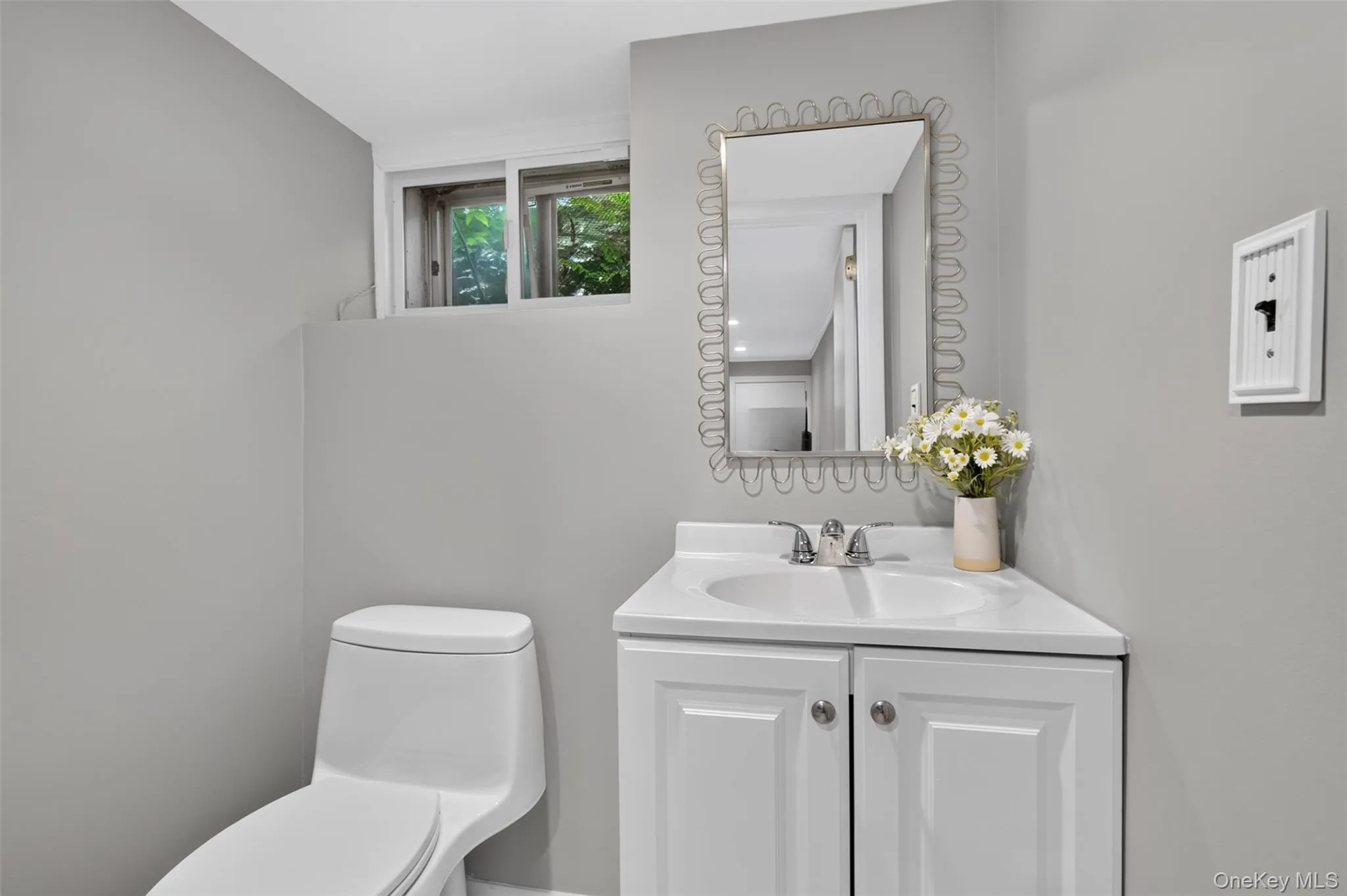 Powder Room on Lower Level Powder Room on Lower Level