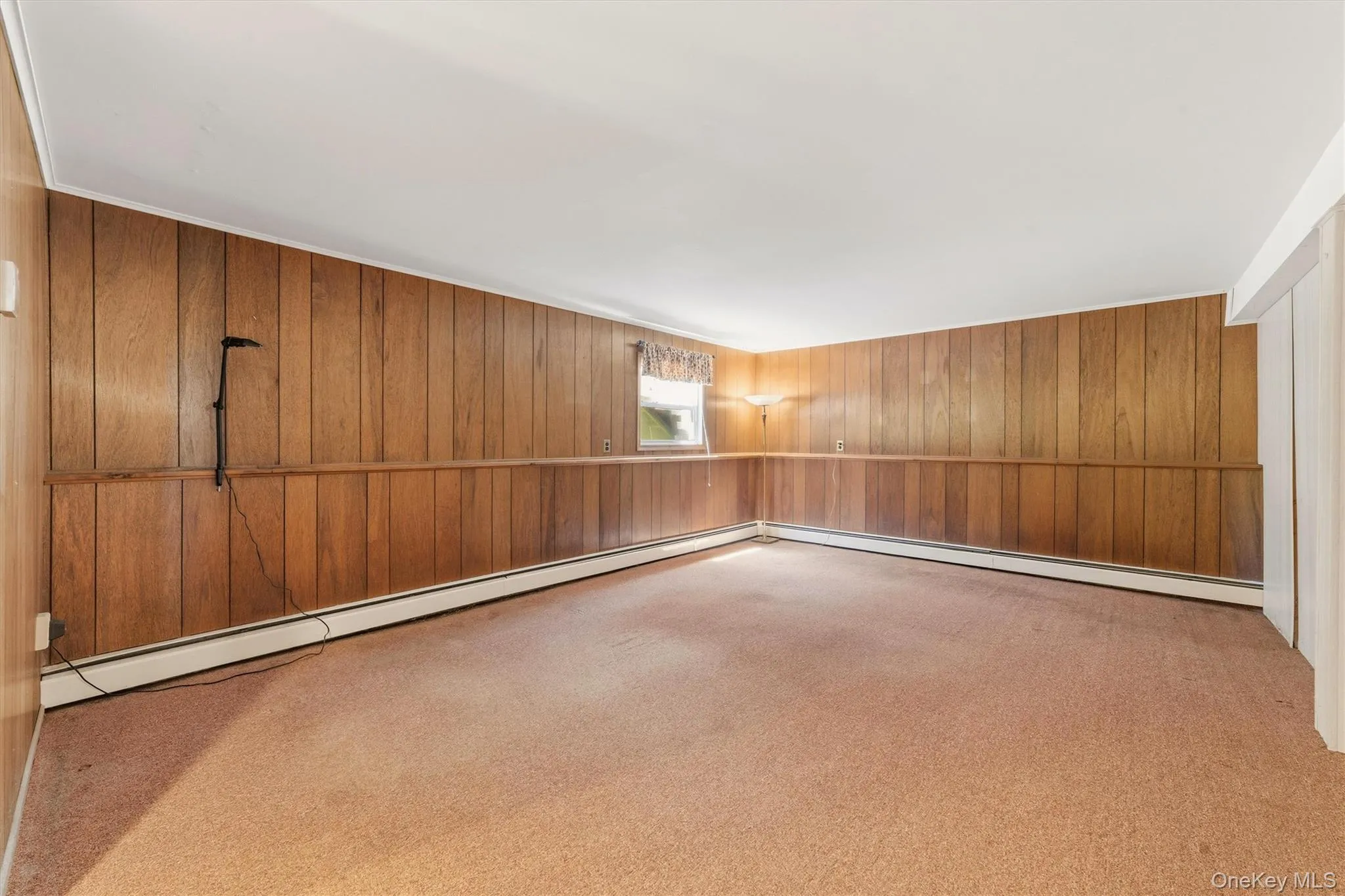 One large room in the lower level separated by a removable partition, this is the larger side. One large room in the lower level separated by a removable partition, this is the larger side.