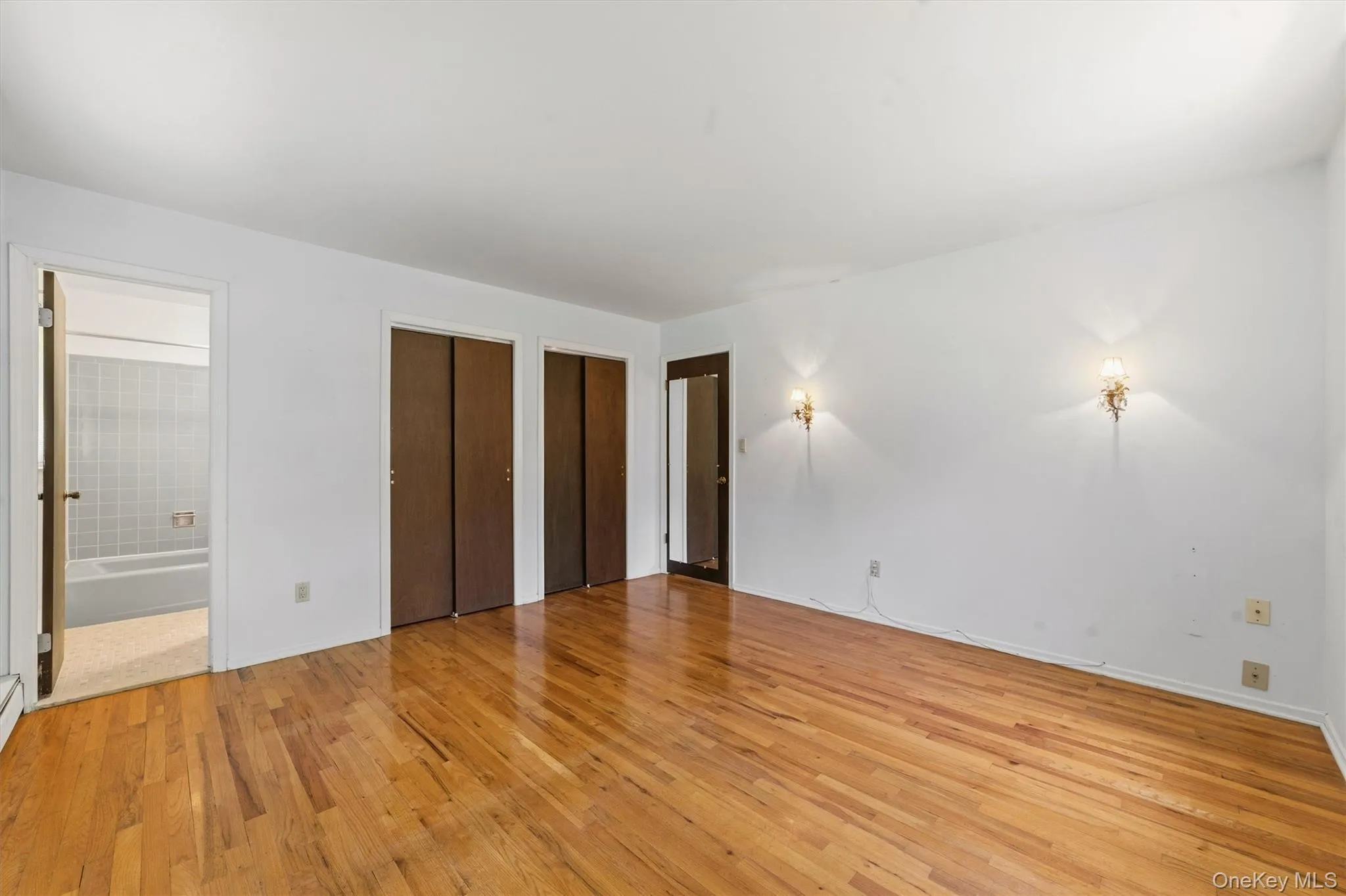 Spacious primary bedroom, 2 closets, multiple windows and connects to full hall bath. Spacious primary bedroom, 2 closets, multiple windows and connects to full hall bath.