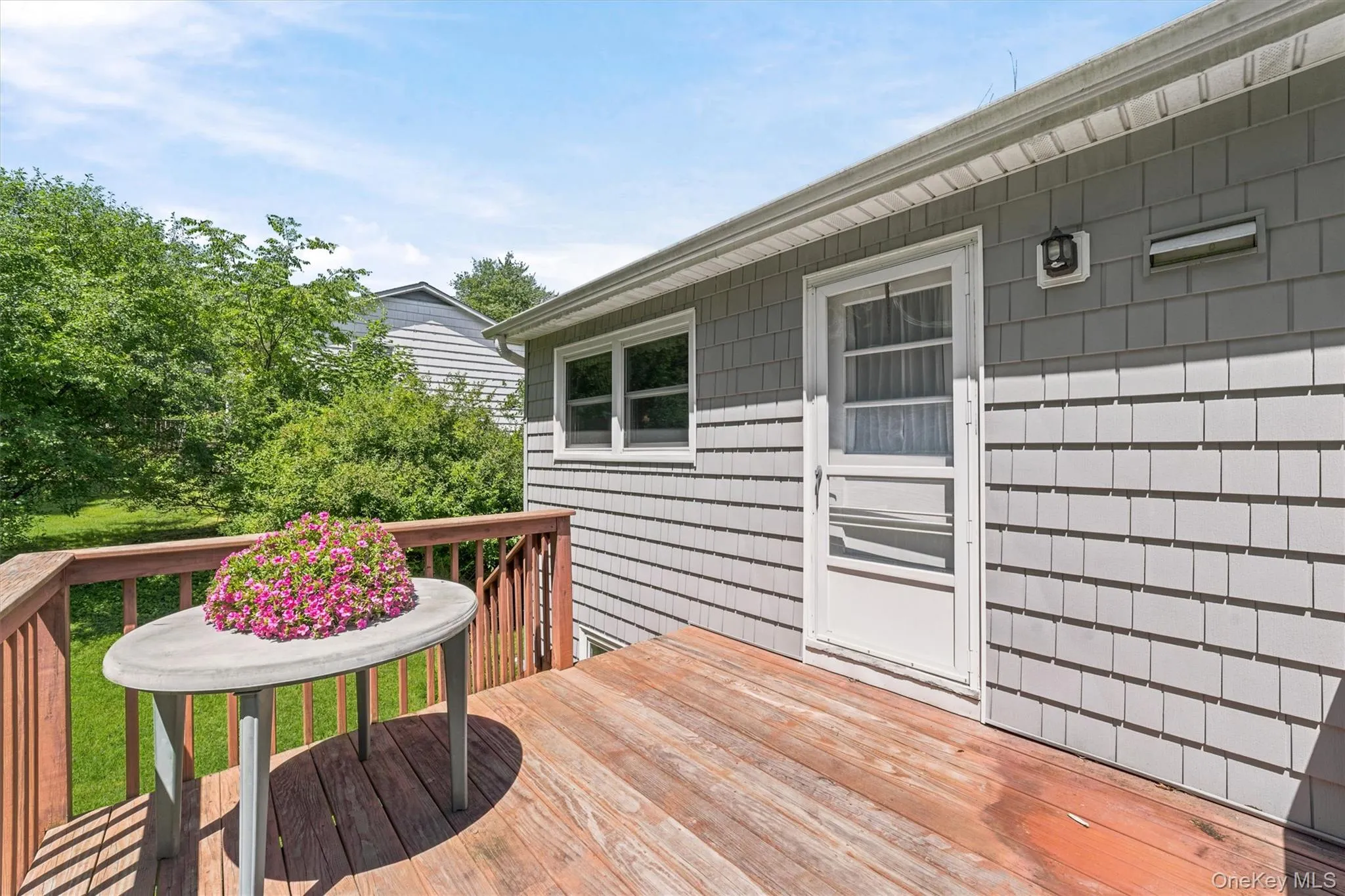 Deck off kitchen. Deck off kitchen.