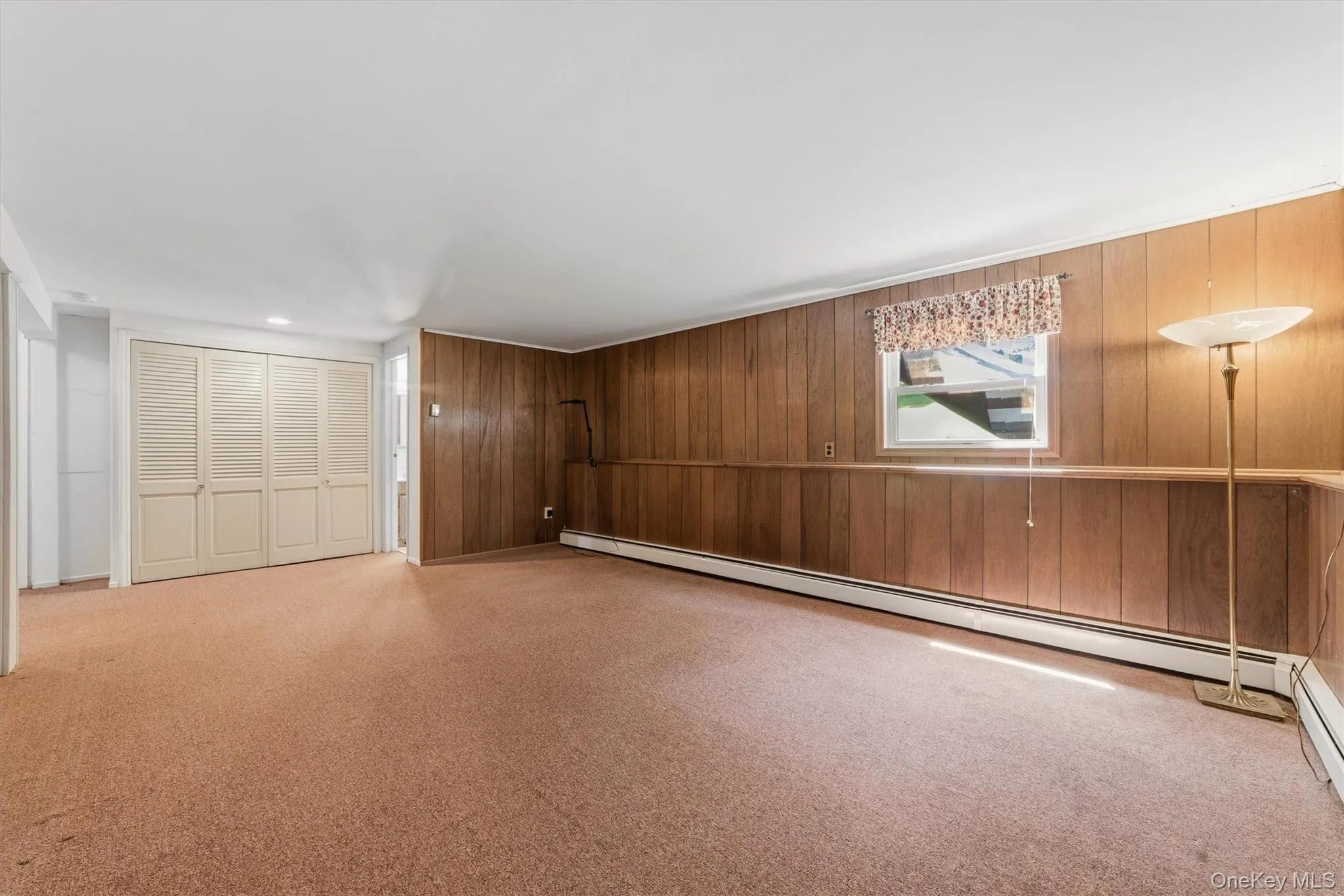 One large room in the lower level separated by a removable partition, this is the smaller side. One large room in the lower level separated by a removable partition, this is the smaller side.