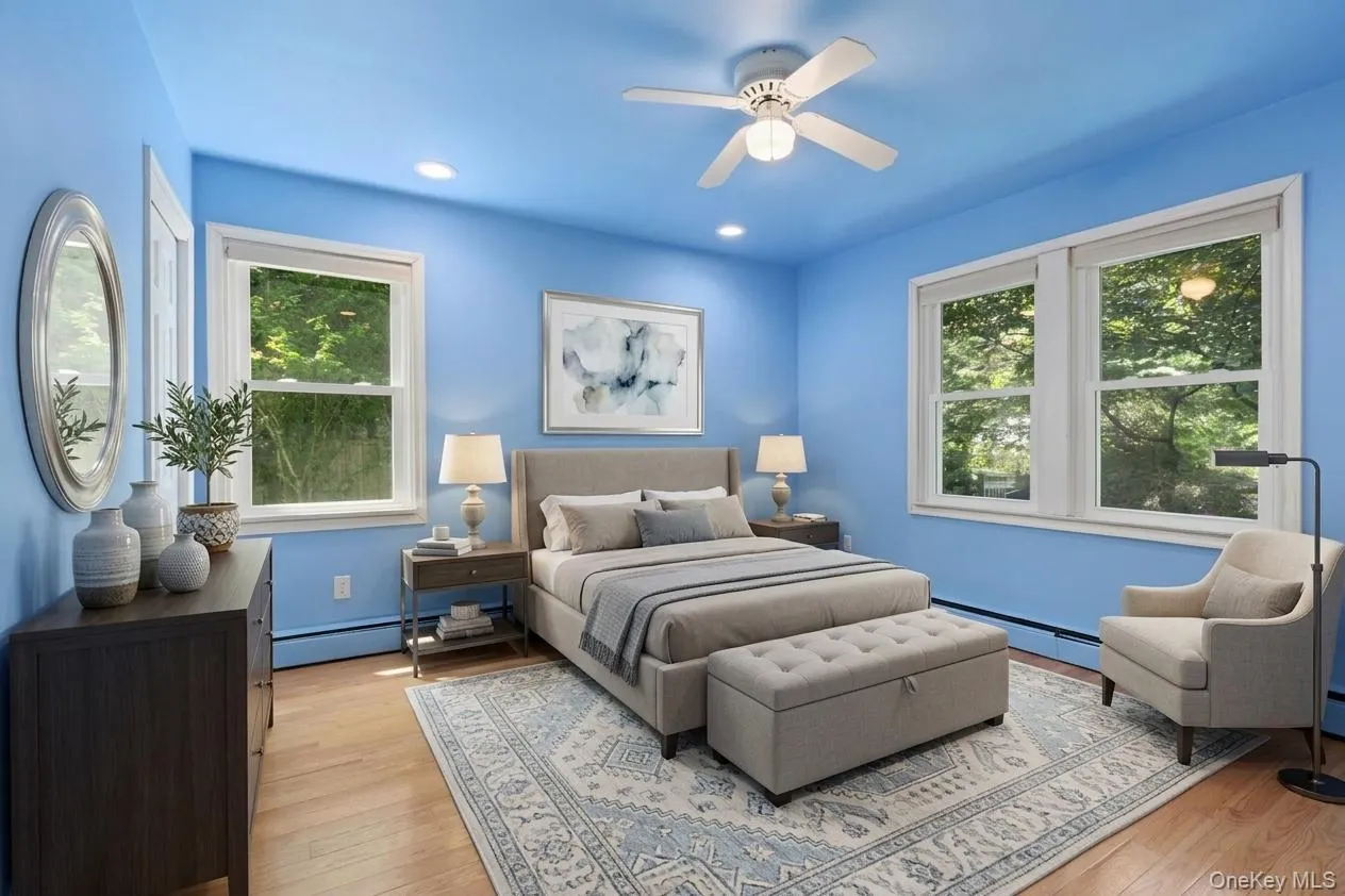 Light and bright with 3 windows and hardwood floors Light and bright with 3 windows and hardwood floors