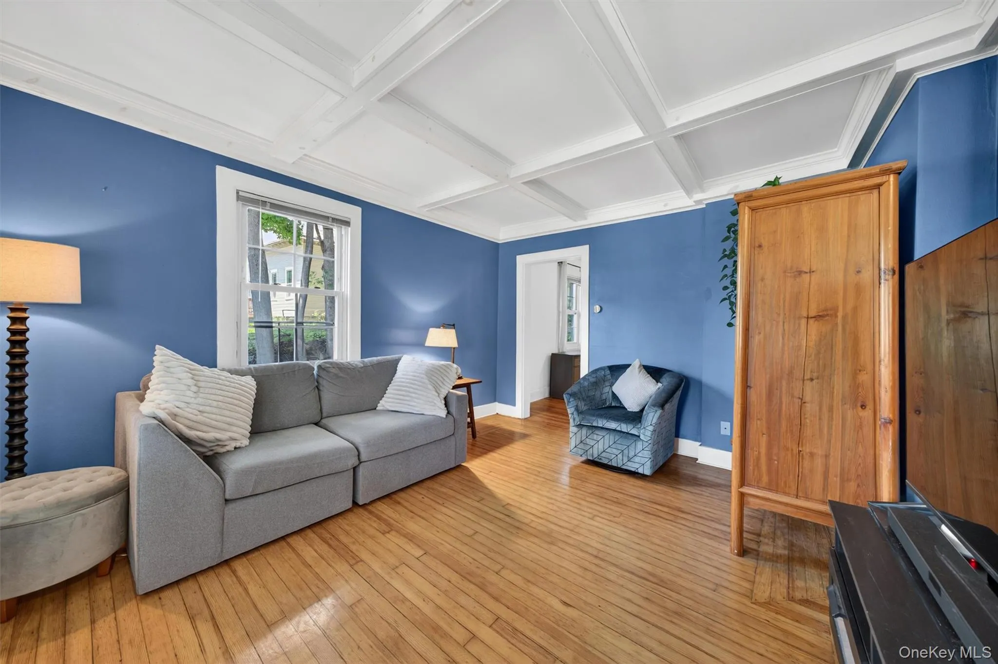 The ceiling is adorned with period molding. The ceiling is adorned with period molding.