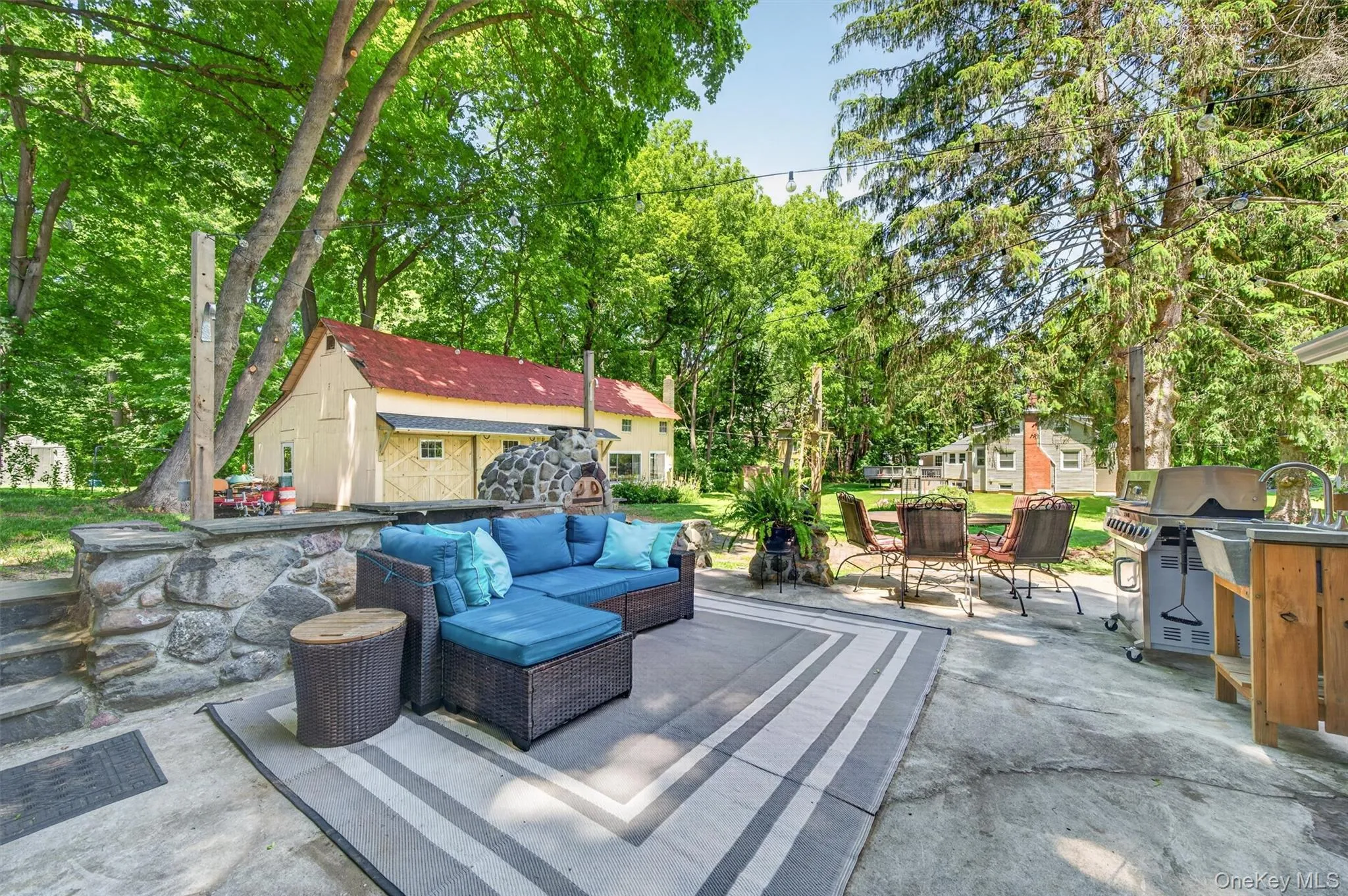 Entertain or relax on the cozy stone patio. Entertain or relax on the cozy stone patio.