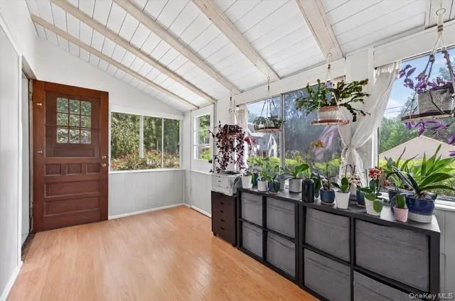 The sunroom is a great flex space for an office, den or porch The sunroom is a great flex space for an office, den or porch