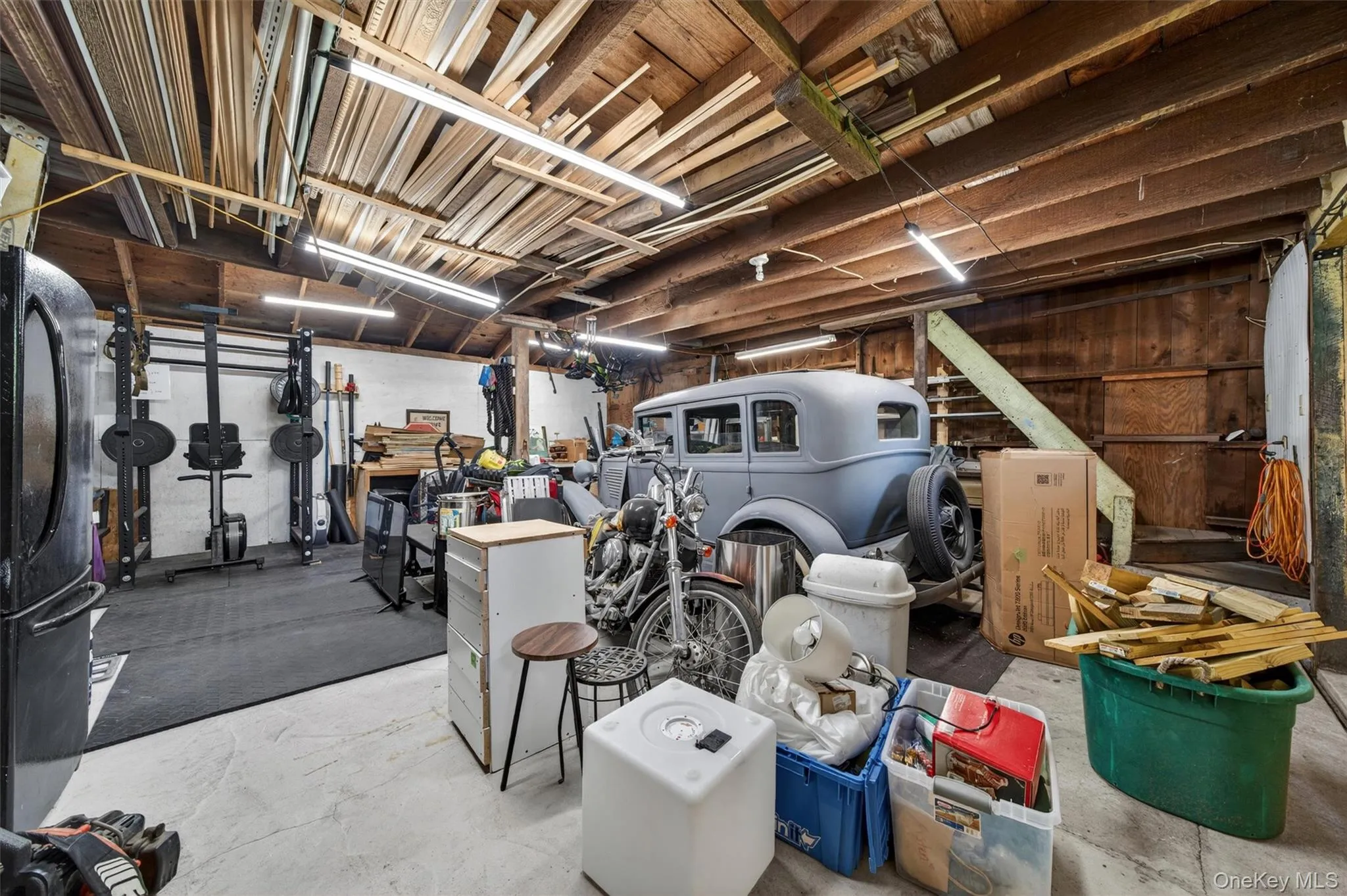 The left side is home to an oversized two car garage. The left side is home to an oversized two car garage.