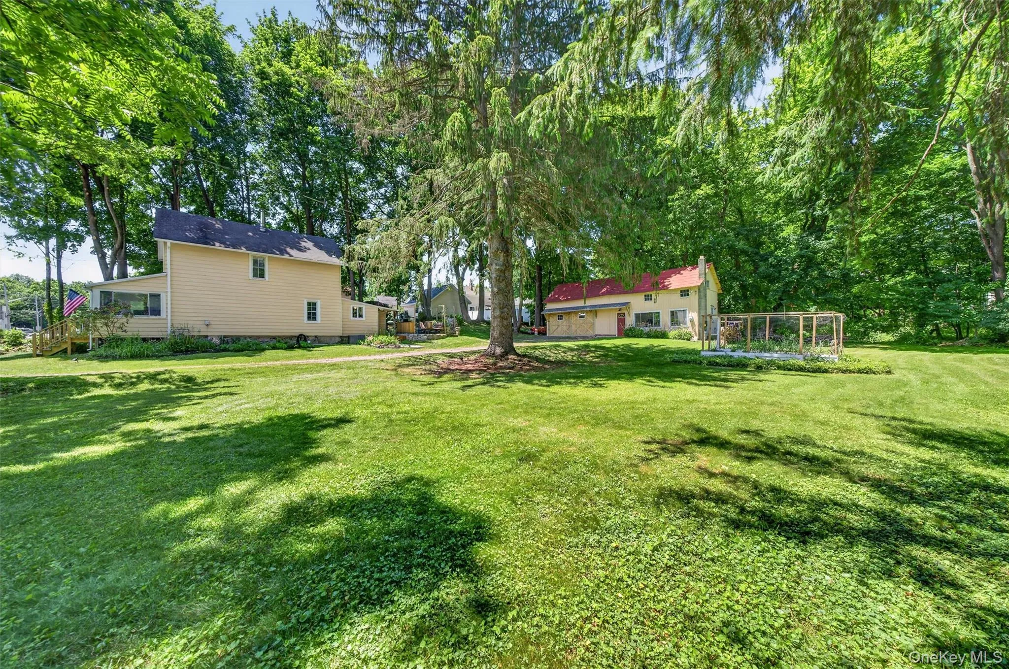 Unlike most homes on the street this house has a large side yard. Unlike most homes on the street this house has a large side yard.