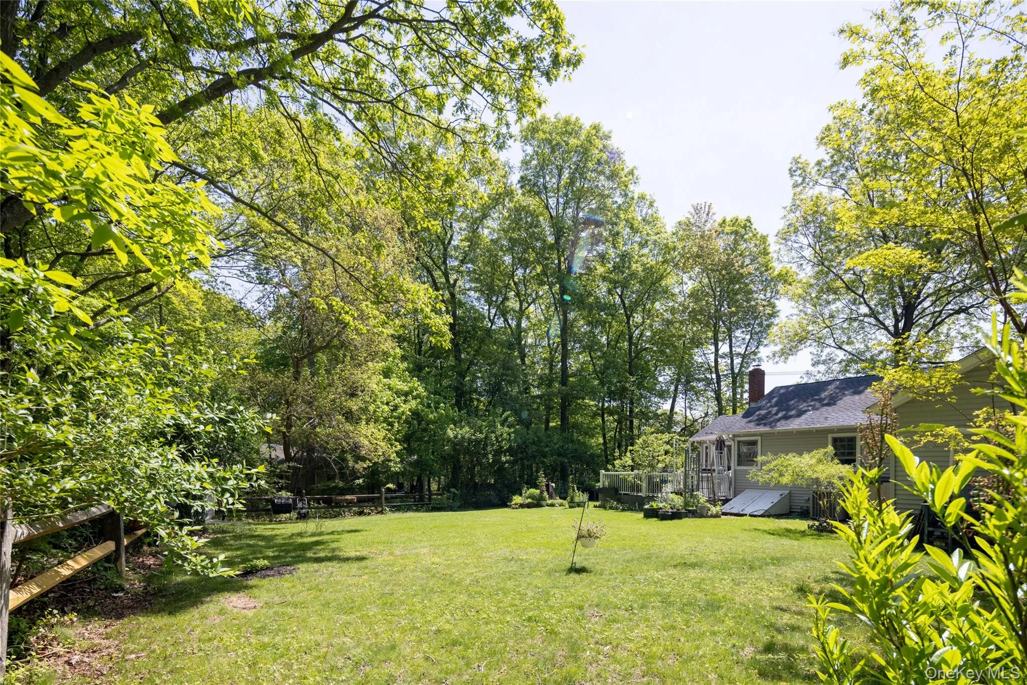 Rear yard with split rail fence and bilco entrance Rear yard with split rail fence and bilco entrance